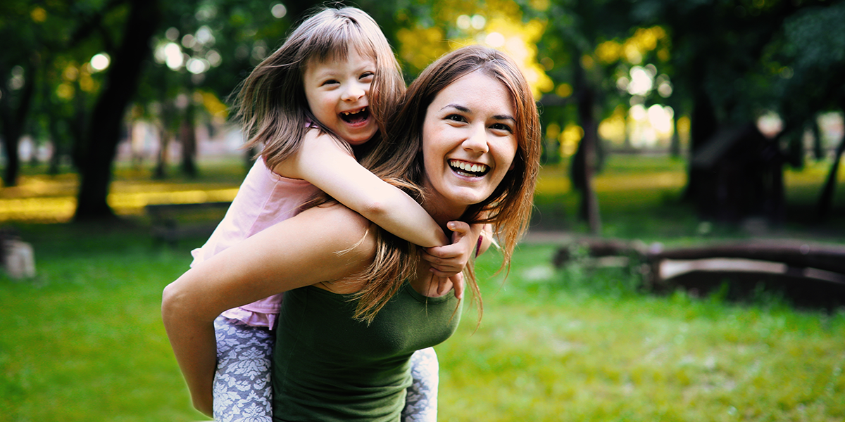 mom and daughter in park