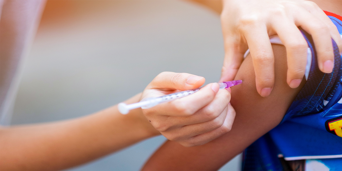 kid receiving vaccine shot